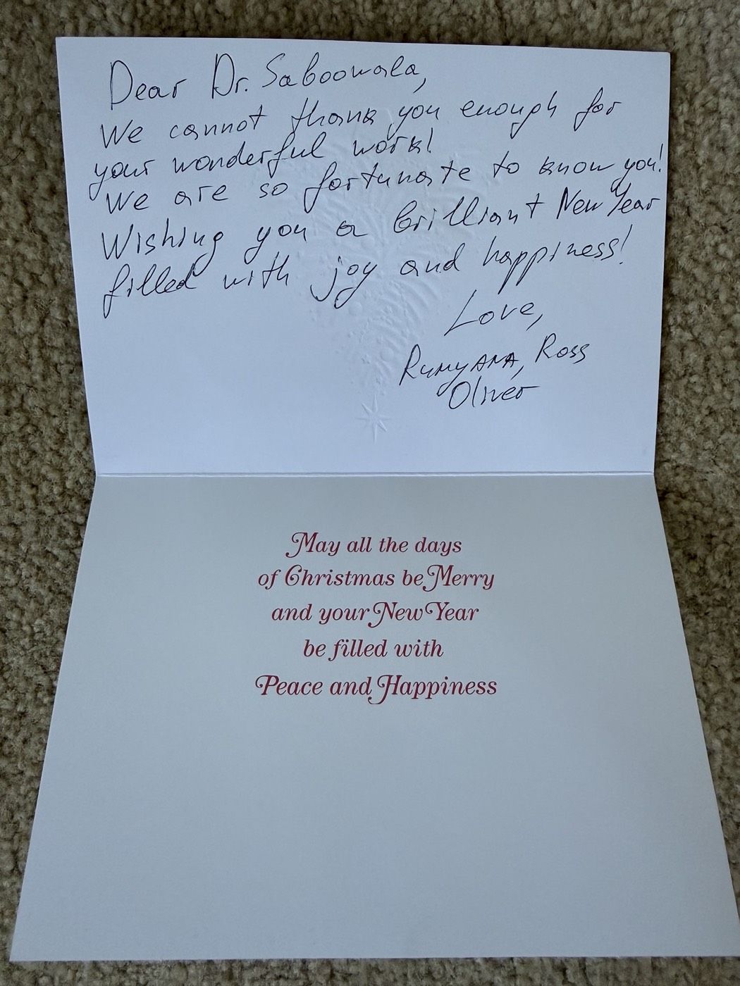Handwritten holiday thank-you note to Dr. Saboowala from Rumyana, Ross and Oliver